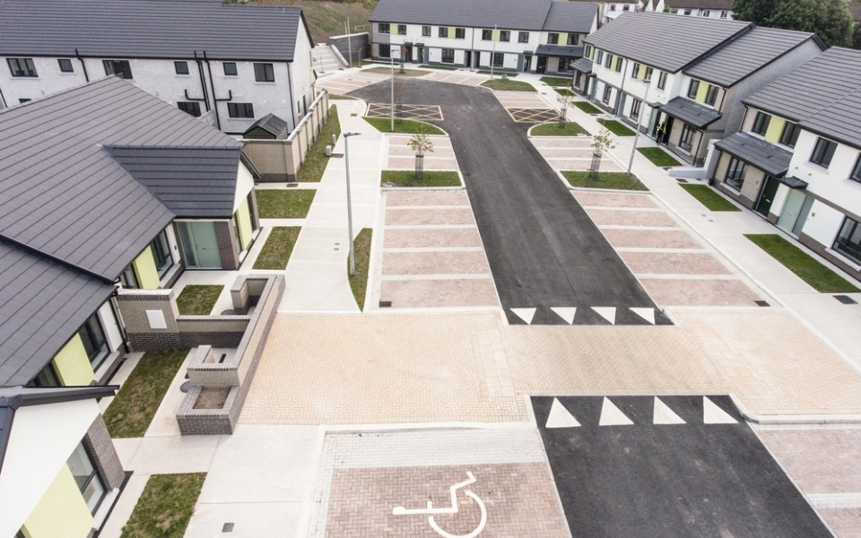 Esker Park consists of a mixture brick and plaster external finishes with a prefabricated truss roof slated, UPVC triple glazed window units with PVC down pipes and gutters. Esker Park consists of a mixture brick and plaster external finishes with a prefabricated truss roof slated, UPVC triple glazed window units with PVC down pipes and gutters.